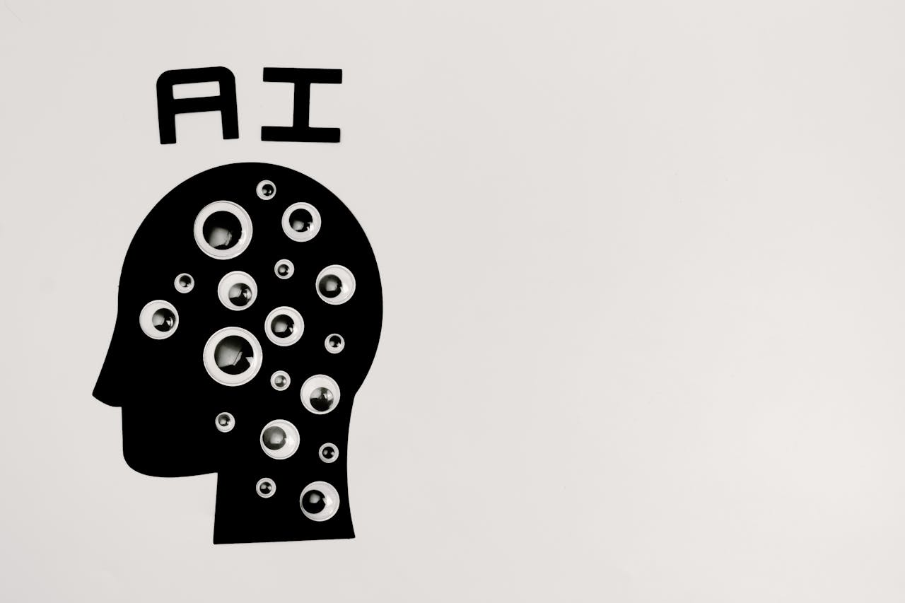 about-img Abstract illustration of AI with silhouette head full of eyes, symbolizing observation and technology.